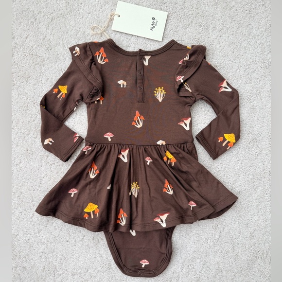Kyte Baby Long Sleeve Twirl Bodysuit Dress in Brown Mushroom Print - Picture 9 of 12